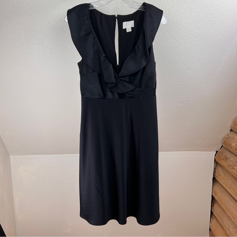 J CREW Black Ruffled Deep V neckline w/faux wrap embellishment. Size 6. Lined.